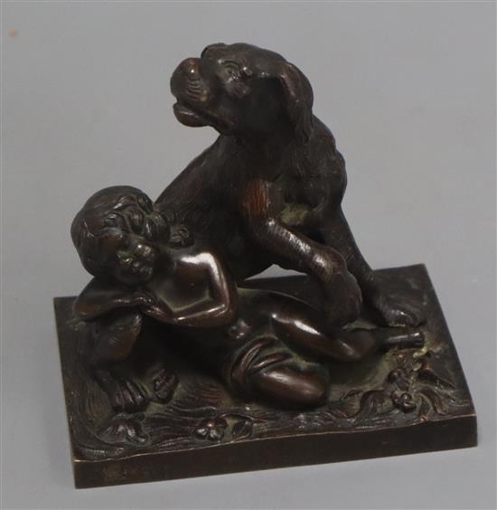 A 19th century French bronze of a child and attendant hound H.12cm